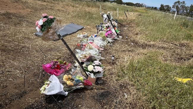 A roadside memorial for a Buckland Park teen killed in a crash in Adelaide's north has grown to several metres as loved ones continue to pay tribute. Picture: Natalie Vikhrov