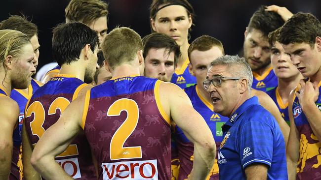 Brisbane coach Chris Fagan talks to his players.