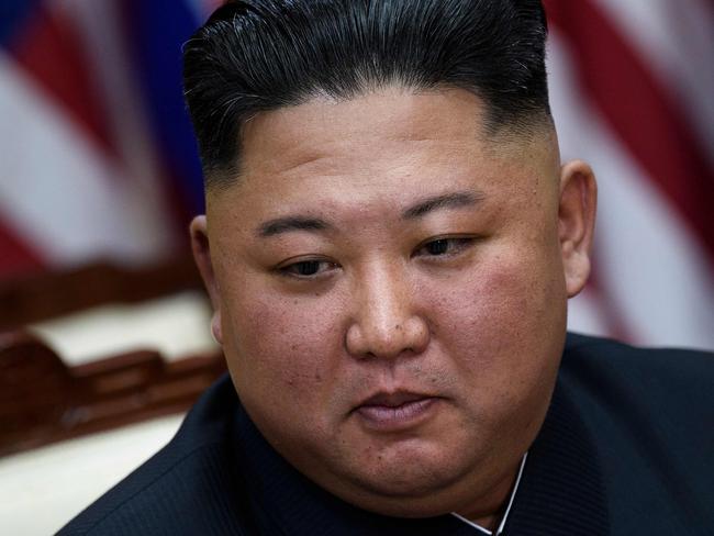 TOPSHOT - North Korea's leader Kim Jong Un before a meeting with  US President Donald Trump on the south side of the Military Demarcation Line that divides North and South Korea, in the Joint Security Area (JSA) of Panmunjom in the Demilitarized zone (DMZ) on June 30, 2019. (Photo by Brendan Smialowski / AFP)