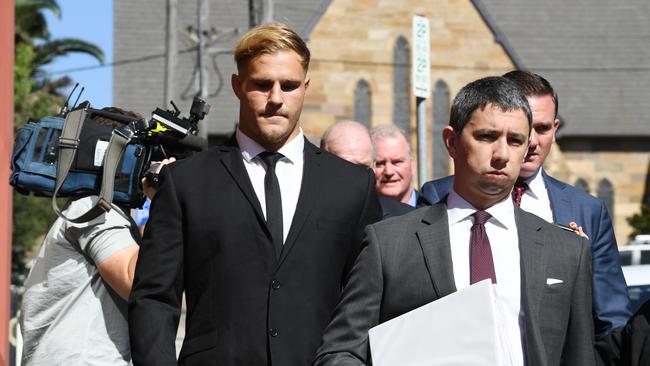 St George Illawarra player Jack de Belin, left, leaves Wollongong Local Court yesterday. Picture:  AAP