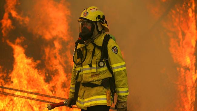 NSW Fire and Rescue battling a blaze south of Taree on Tuesday. Picture: Jane Dempster