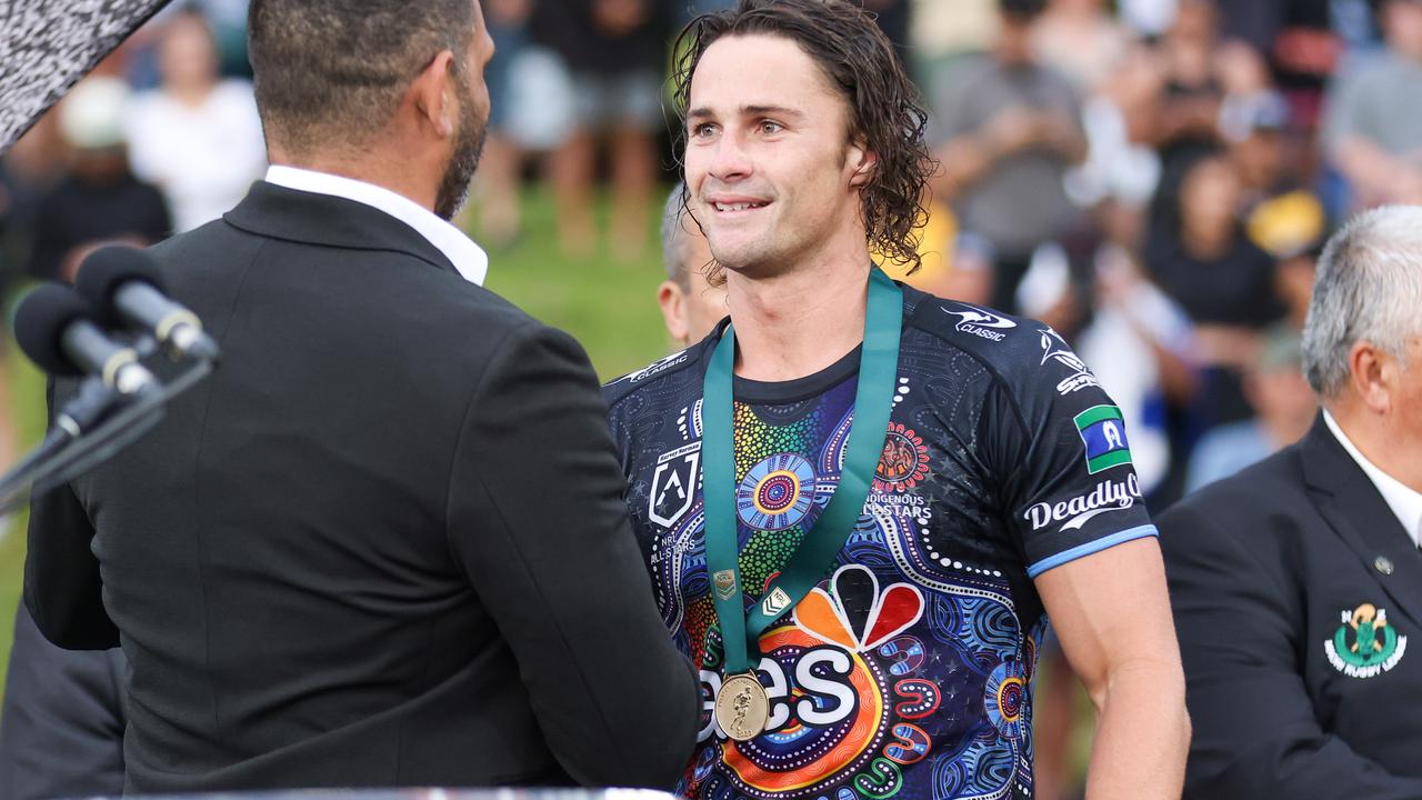 Nicho Hynes receives his NRL All Stars man-of-the-match award from Greg Inglis. Picture: NRL Imagery