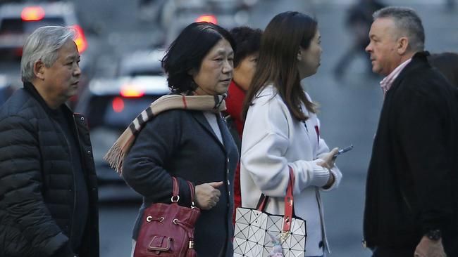 SYDNEY, AUSTRALIA - NewsWire Photos JULY 17, 2024:  Pedestrians crossing Bridge street in the Sydney CBD. The Australian Bureau of Statistics, (ABS) releases it's latest job figures tomorrow.  Picture: NewsWire / John Appleyard