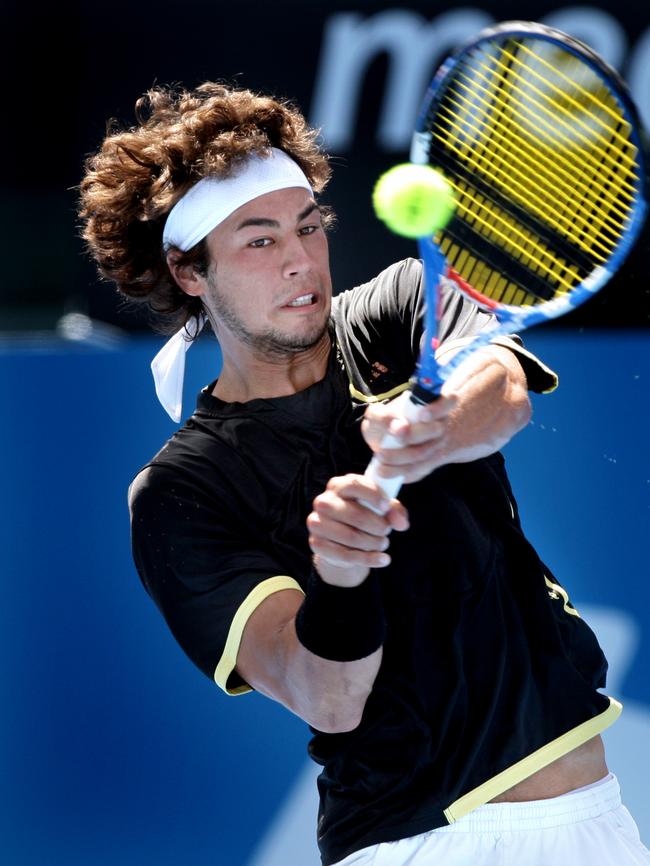 Nick Lindahl returns a shot to Marcos Baghdatis.