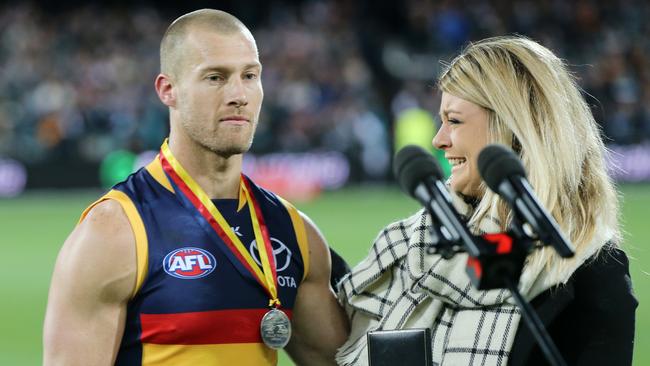 Scott Thompson wins the Phil Walsh medal presented by Quinn Walsh, daughter of Phil. Picture: Calum Robertson