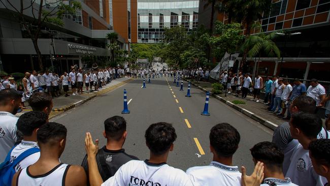 A vigil outside the Albert Einstein Israelite Hospital where Pele is hospitalised in Sao Paulo.