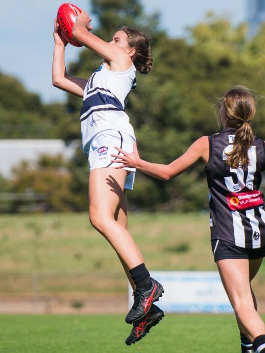 Northern Knights Ellie McKenzie rises to mark. Picture: Russ Canham.