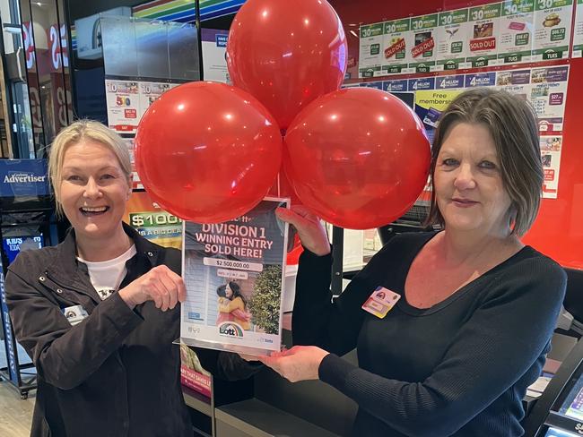 Leopold News and Lotto staff members Carol Horne and Gabrielle Lutz celebrate a winning division one Tattslotto ticket being purchased at the store.