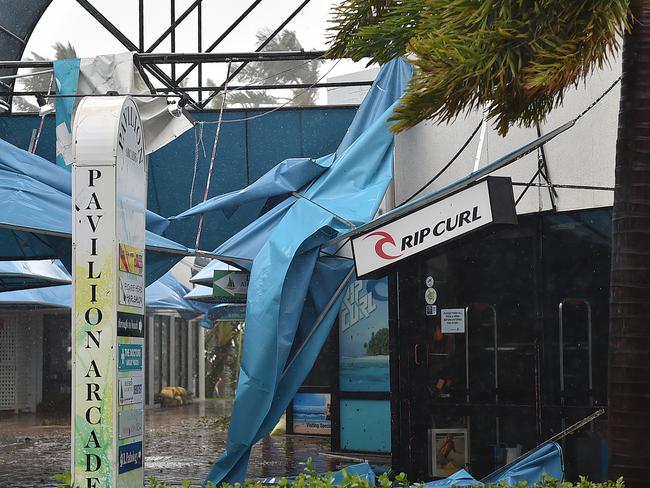 Shops have been trashed on the main street of Airlie. Picture: Alix Sweeney