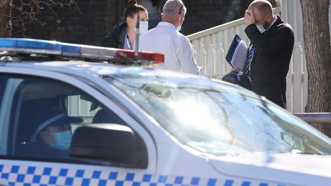 Detectives outside the Mayfield unit on Regent St following the murder of Brian O’Sullivan on June 29, 2021. Picture: David Swift