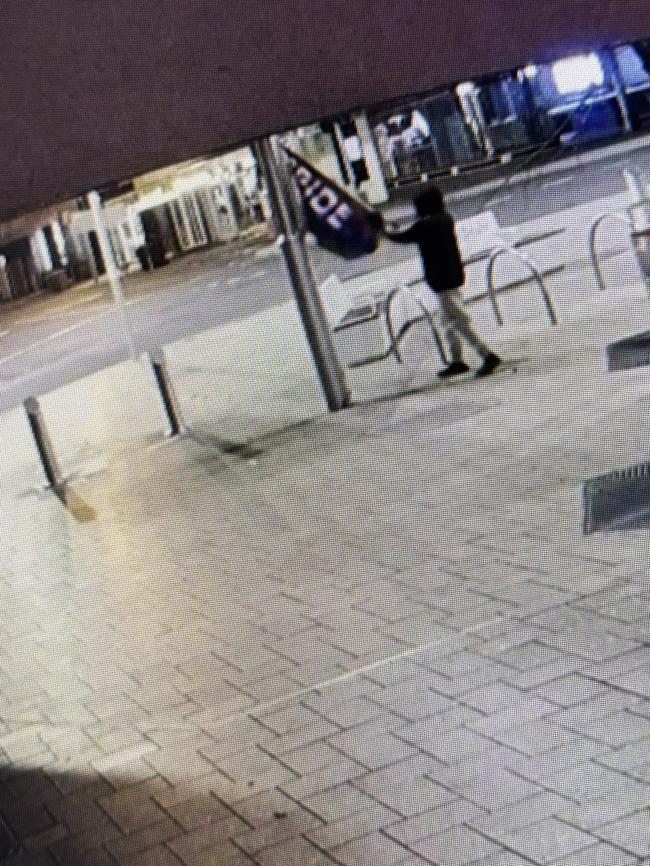 Vandal strikes rainbow LGBTQIA+ flag in Launceston during Pride Month. Picture: Supplied CCTV