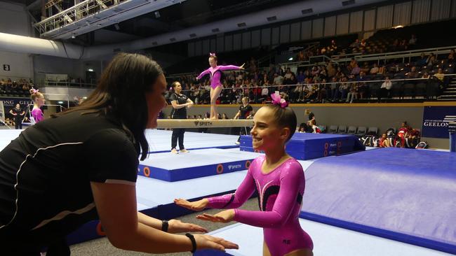 Coaches stood on the sidelines to support their athletes. Picture: Supplied