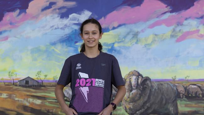 Tara Kate Russell, 13, is a competitive swimmer with her eyes on the 2032 Brisbane Olympics who wants the town to keep its 50 metre pool. Picture: Mark Cranitch.