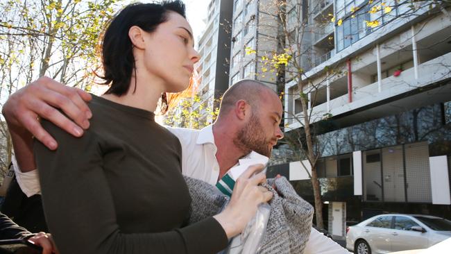 John Ibrahim’s model and bar-owner girlfriend Sarah Budge looked visibly downcast as she left Sydney Police Centre after posting bail. Picture: Richard Dobson