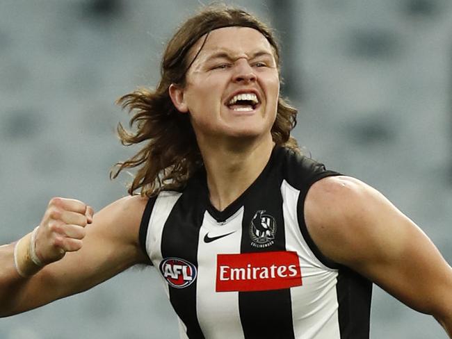 MELBOURNE, AUSTRALIA - JULY 31: Jack Ginnivan of the Magpies celebrates a goal during the round 20 AFL match between Collingwood Magpies and West Coast Eagles at Melbourne Cricket Ground on July 31, 2021 in Melbourne, Australia. (Photo by Darrian Traynor/Getty Images)