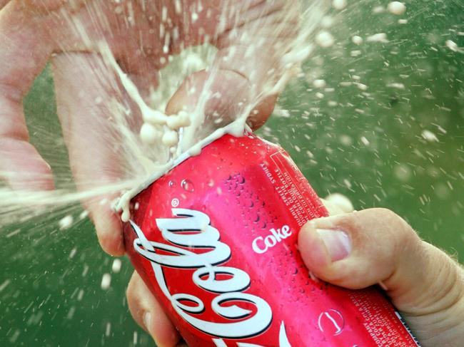 Matthew Harris opening a can of Coca-Cola 03 Aug 2004. coke drink