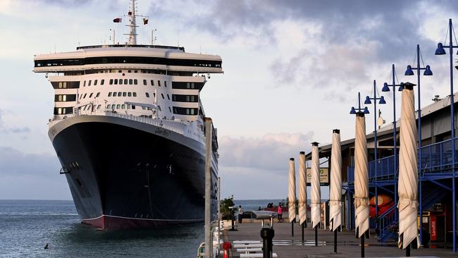 The Queen Mary 2 arrives at Stokes Hill Wharf in Darwin. She is on a round the world voyage and is overnighting in port. Picture: Che Chorley