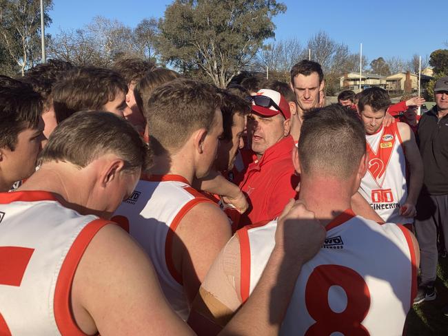 Chiltern coach Luke Brookes talks to his players during a break this season. The club is chasing its first premiership in the Tallangatta and District Football League. Picture: David Johnston