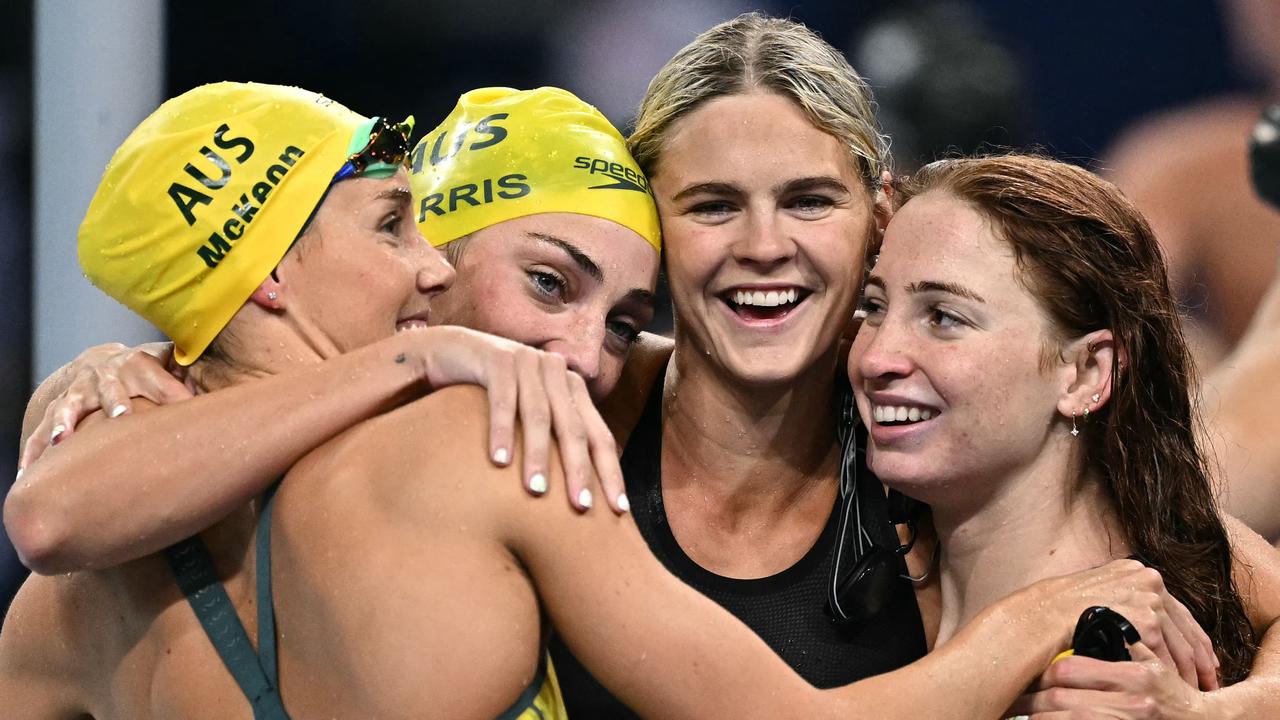 Australia’s Emma McKeon, Meg Harris, Shayna Jack and Mollie O’Callaghan celebrate after bringing home gold in the 4x100m freestyle relay. Picture: Manan Vatsyayana/AFP