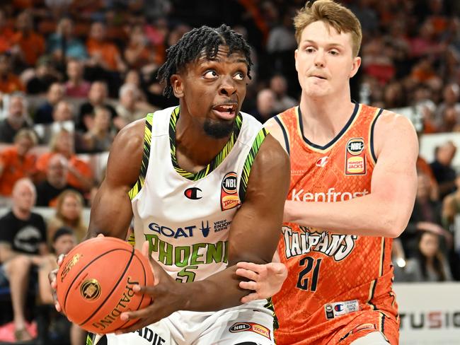 Tyler Cook goes to the basket during the round 2 NBL match between Cairns Taipans and South East Melbourne Phoenix at Cairns Convention Centre. Photo: Emily Barker/Getty Images.