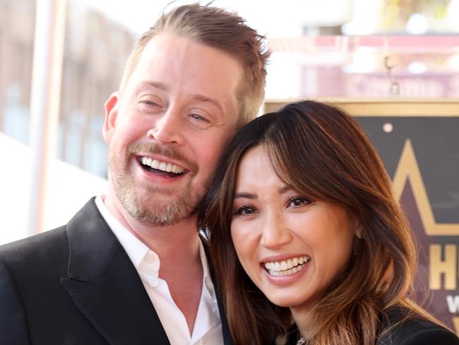 HOLLYWOOD, CALIFORNIA - DECEMBER 01: (L-R) Macaulay Culkin and Brenda Song attend the ceremony honoring Macaulay Culkin with a Star on the Hollywood Walk of Fame on December 01, 2023 in Hollywood, California. (Photo by Amy Sussman/Getty Images)