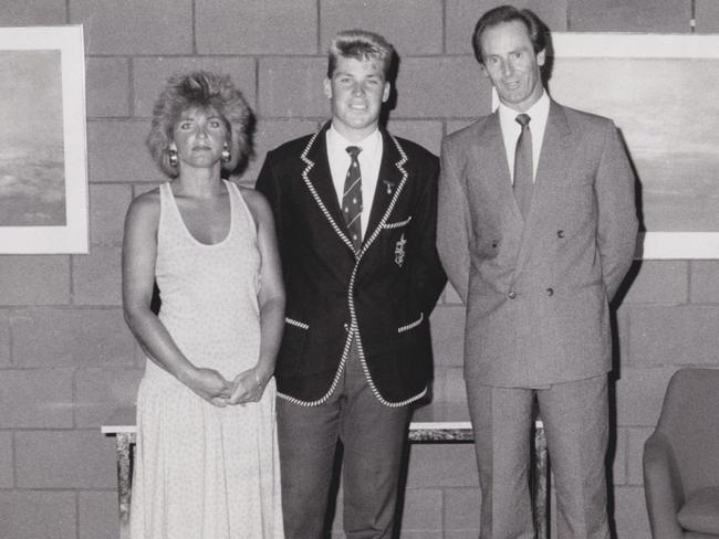 A young Shane with his parents Brigitte and Keith.