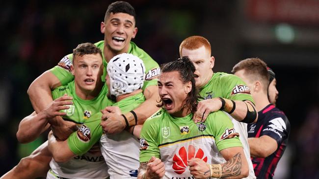Charnze Nicoll-Klokstad and the Raiders celebrate their win over Melbourne. Picture: AAP