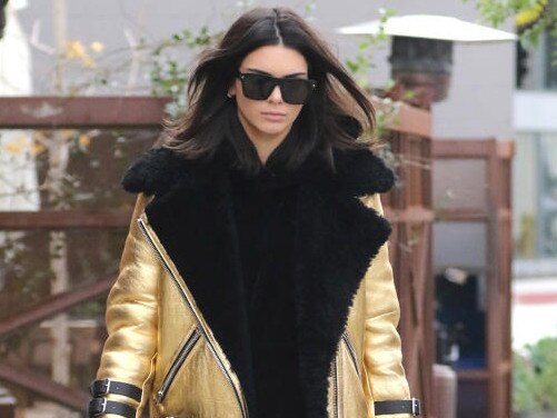 Model Kendall Jenner rocks an Acne Studios gold jacket that proved popular among A-listers. Picture: Popsugar