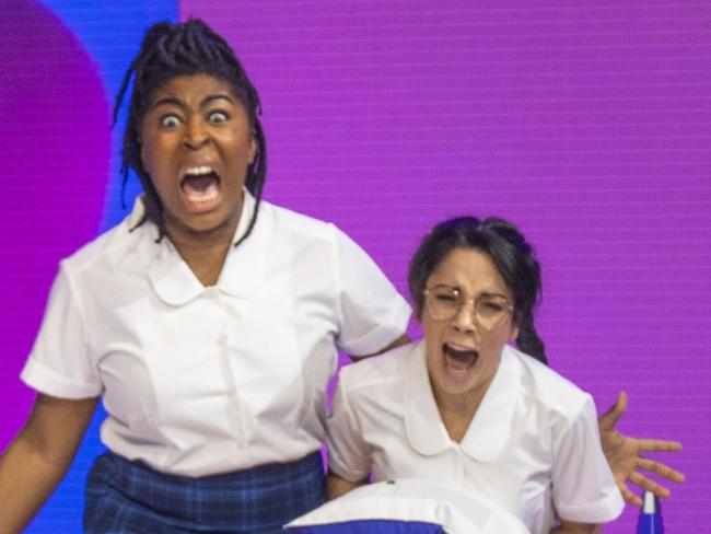 6th September 2019.Yve Blake(right) has written a new play called Fangirls for the Queensland Theatre company. It's about young super-fans who become obsessed with pop stars in the age of the internet. L-R. (Actors on bed) - Chika Ikogwe playing Jules and Kimberley Hodgson playing Brianna.Photo: Glenn Hunt / The Australian