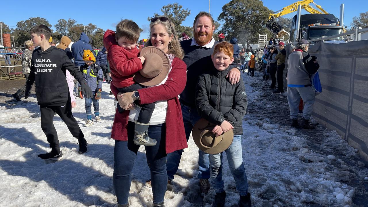 Elliot Donovan (3), Kate Hawkins, James Donovan and Mathew Price (11) from Fernvale in the snowfields at the 2021 Snowflakes in Stanthorpe festival on day 3. Photo: Madison Mifsud-Ure / Stanthorpe Border Post