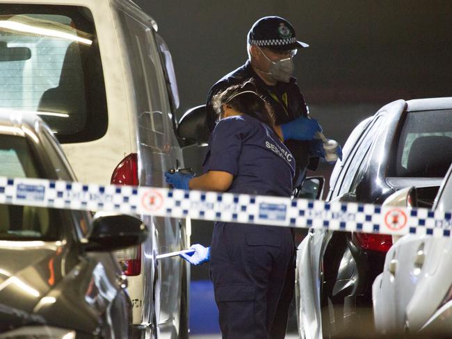 Forensics officers at the scene where former Comanchero bikie boss Mahmoud "Mick" Hawi was shot dead Picture: Damian Hofman