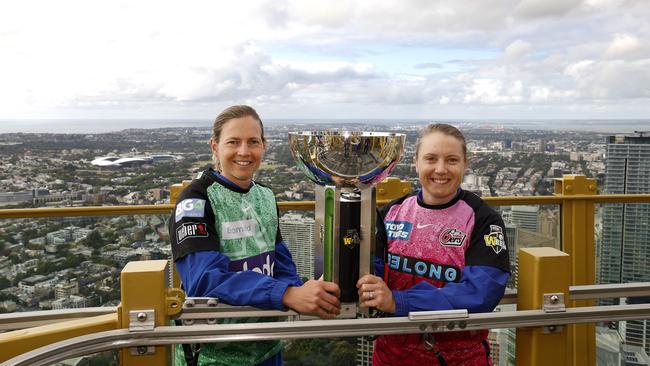 Recently retired Aussie cricket captain Meg Lanning of the Melbourne Stars and Alyssa Healy of the Sydney Sixers on the Skywalk of the Sydney Tower Eye last month. Picture: Phil Hillyard