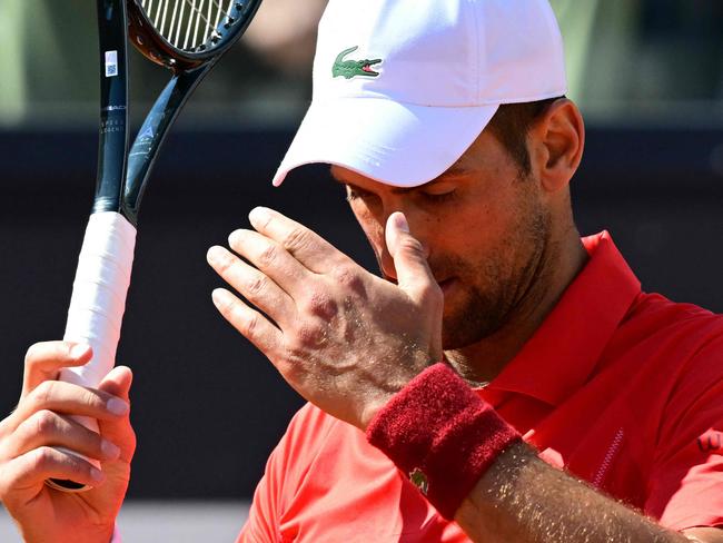 Serbia's Novak Djokovic reacts during his match against Chile's Alejandro Tabilo at the Men's ATP Rome Open tennis tournament at Foro Italico in Rome on May 12, 2024. (Photo by Tiziana FABI / AFP)