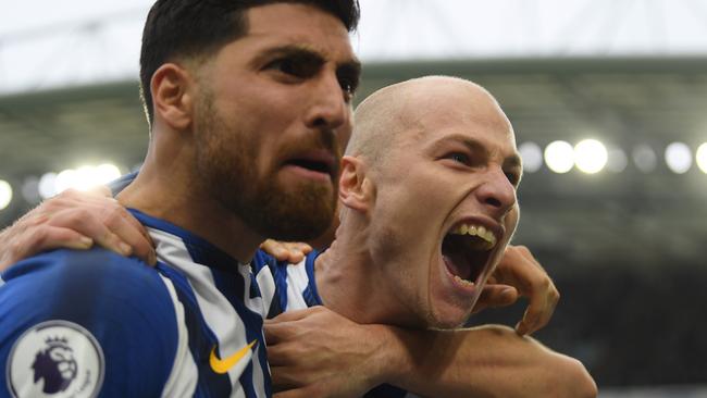 BRIGHTON, ENGLAND - DECEMBER 28: Aaron Mooy of Brighton &amp; Hove Albion celebrates with Alireza Jahanbakhsh after scoring his teams second goal during the Premier League match between Brighton &amp; Hove Albion and AFC Bournemouth at American Express Community Stadium on December 28, 2019 in Brighton, United Kingdom. (Photo by Mike Hewitt/Getty Images) **BESTPIX**