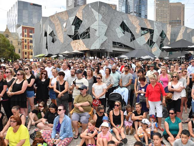 People gathered at Federation Square for a city vigil. Picture: Jake Nowakowski