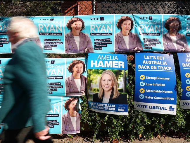 Signs for Amelia Hamer and Monique Ryan at Kew Primary School in the seat of Kooyong. Picture: Getty Images