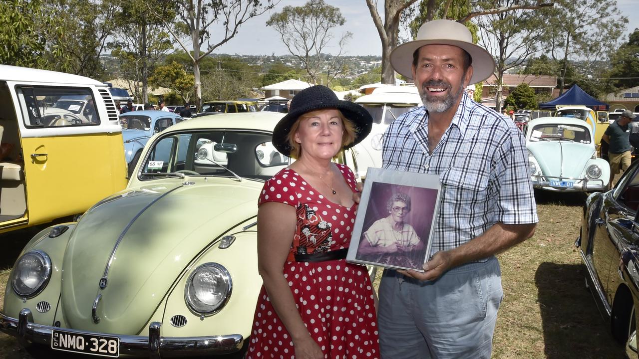 EVENT AXED: Dubs on the Hill has been cancelled for 2021 much to the disappointment of VW fans across the Darling Downs and beyond.<br/>Image taken at Dubs on the Hill, March 2019: This VW Beetle that has been in the Fraser family since 1961, Kym and Rob Fraser with a picture of the original owner, Edna Fraser.