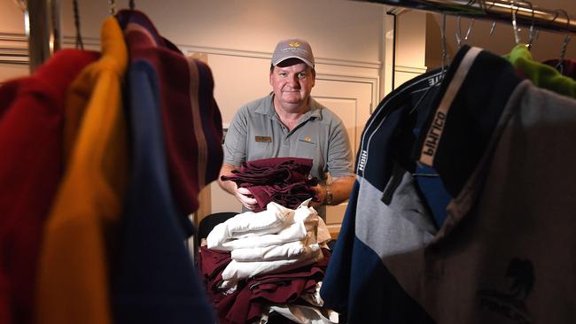 Queensland Country Bank volunteer Darrell Burgess helping get the uniforms ready. PICTURE: MATT TAYLOR.