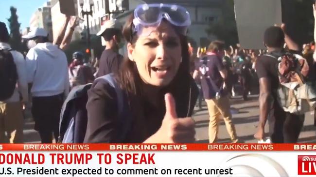 Seven News reporter Amelia Brace after her cameraman were pushed over by riot police. Picture: Sunrise