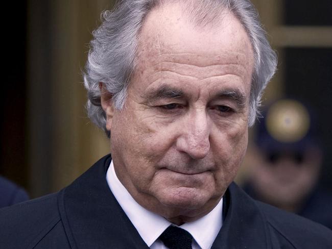 FILE: Bernard Madoff, founder of Bernard L. Madoff Investment Securities LLC, leaves federal court in New York, U.S., on Tuesday, March 10, 2009. Madoff, the Manhattan investment adviser who promised stellar returns to his A-list clients and instead defrauded them of more than $19 billion in history’s largest Ponzi scheme, has died. He was 82. Photographer: Jin Lee/Bloomberg