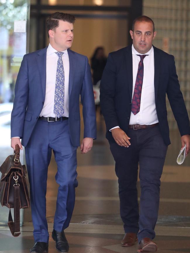 L to R: Lawyer Joshua Blom and Simon Jones leaving Downing Centre Local Court. Picture John Grainger