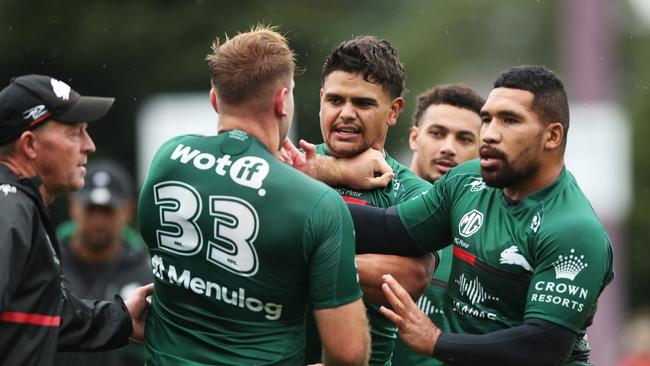 Mitchell and Host then had to be separated by Siliva Havili and assistant coach for ruck performance Steve Antonelli. Picture: Getty Images.