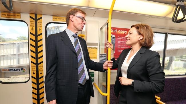 Phillip Strachan, pictured with and Deputy Premier Jackie Trad, said he was proud of what QR achieved since his appointment at the start of 2017. Picture: Tara Croser