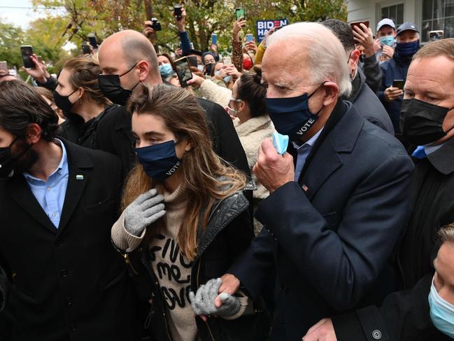 Democratic presidential candidate Joe Biden (C) visits his childhood home with his granddaughters in Scranton, Pennsylvania. Picture: AFP