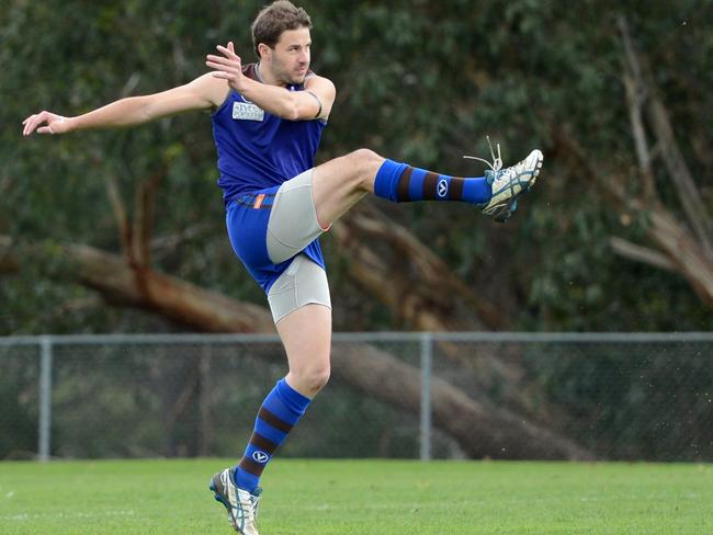 Peninsula Pirates champion Shaun Payze warms up prior to his 300th game in 2013.