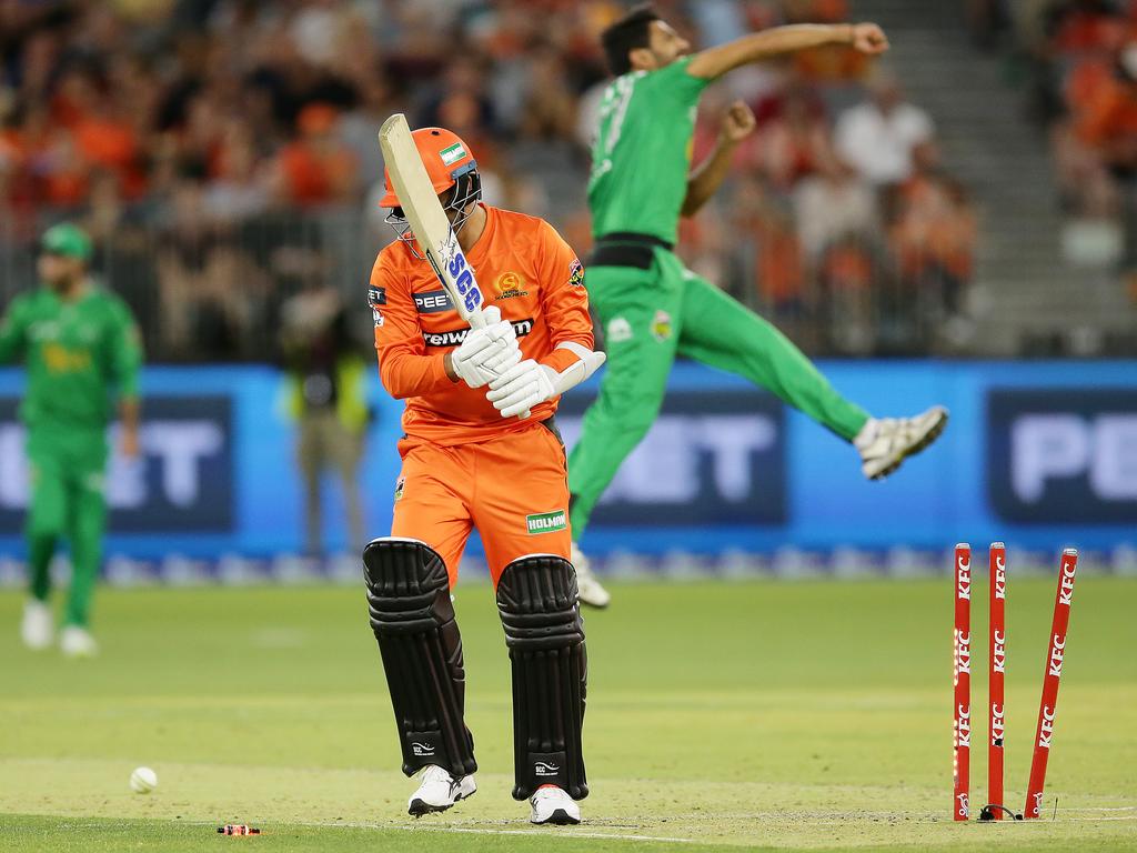 Haris Rauf leaps for joy after bowling Fawad Ahmed with a full toss.