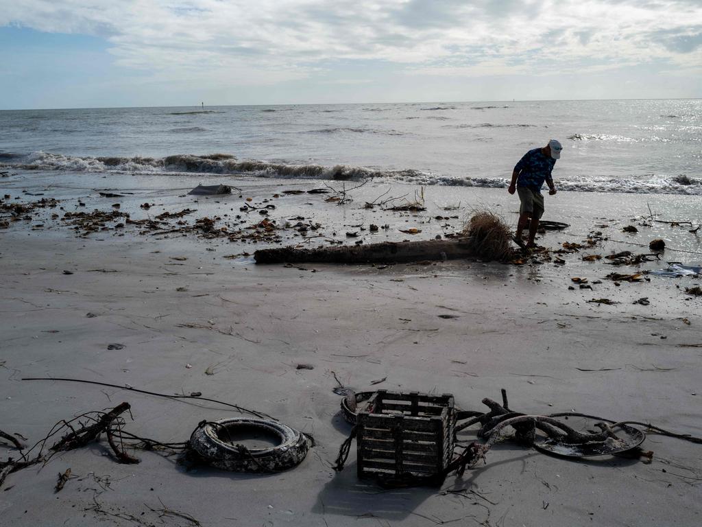 Debris litters a beach as clean up from hurricanes Helene and Milton continues along The Gulf Coast. Picture: Getty Images via AFP