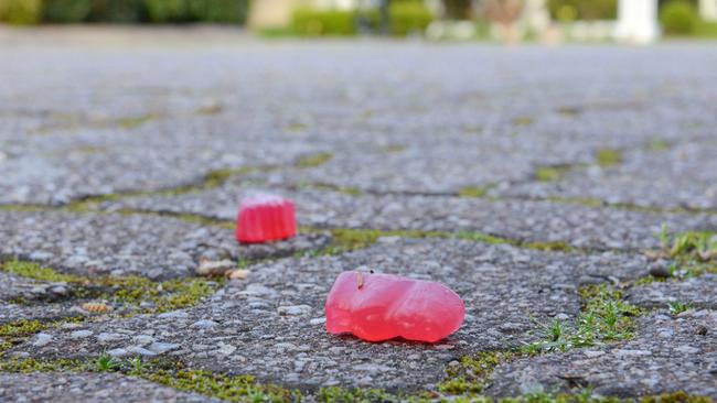 The lolly trail could still be seen hours after the arrests. Picture: AAP/Brenton Edwards