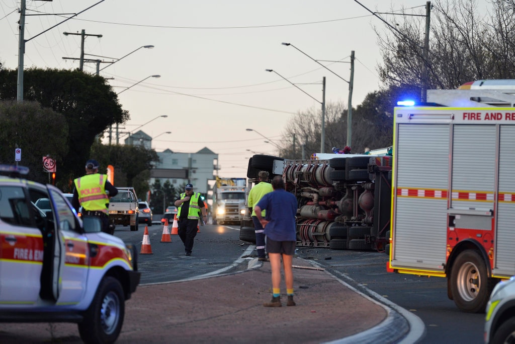 Emergency services at the scene of a cattle truck rollover near the corner of James and Cohoe Sts, Monday, August 20, 2018. Picture: Kevin Farmer