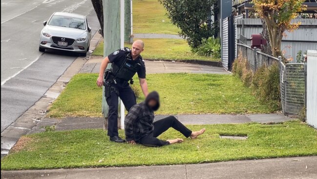 Police arrest a man on Ashton Street, Labrador. Picture: Charlton Hart